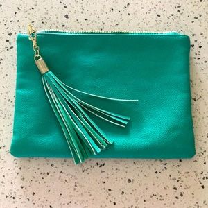 Green faux leather clutch gold hardware & tassel